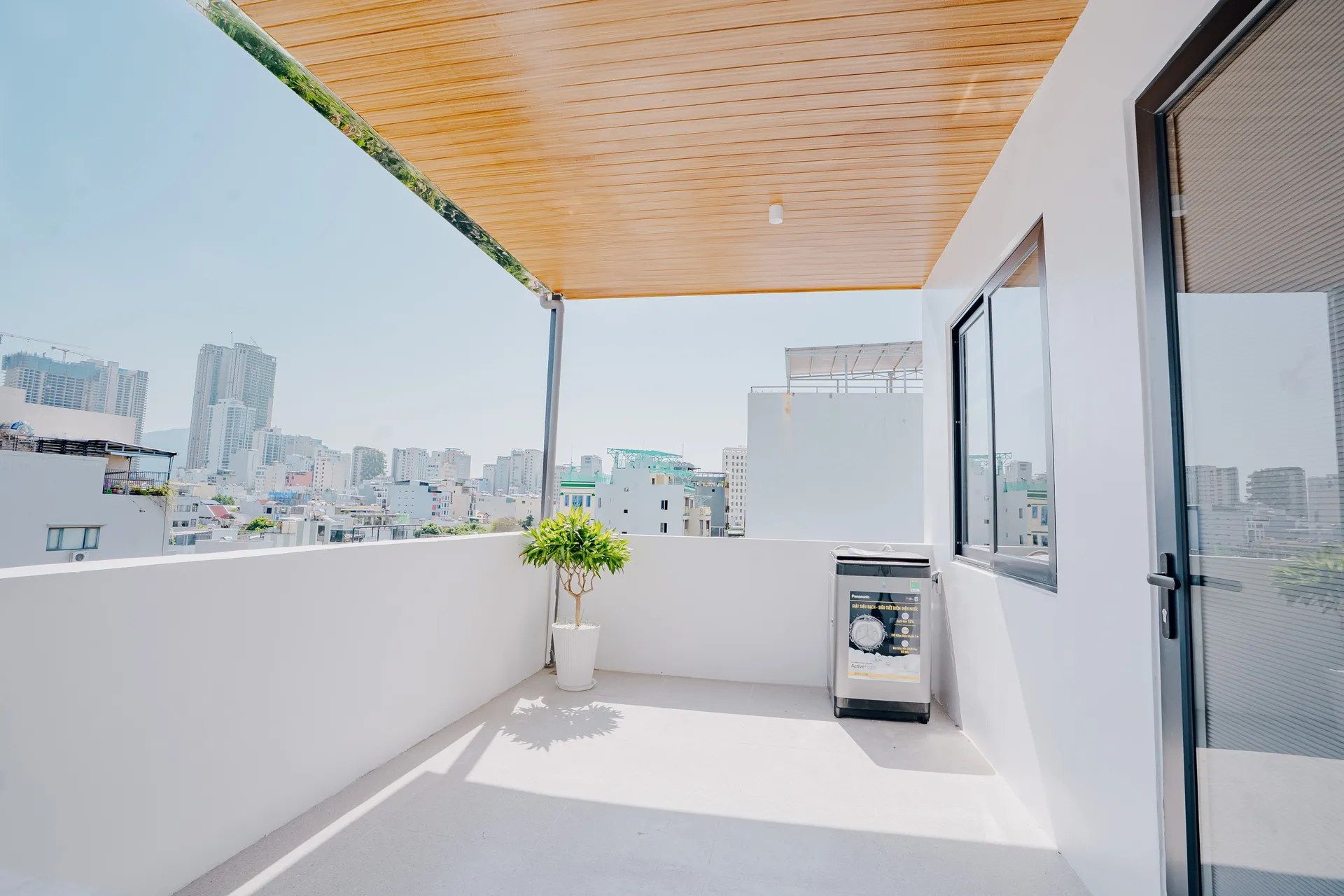 A private rooftop terrace looking out over the city.